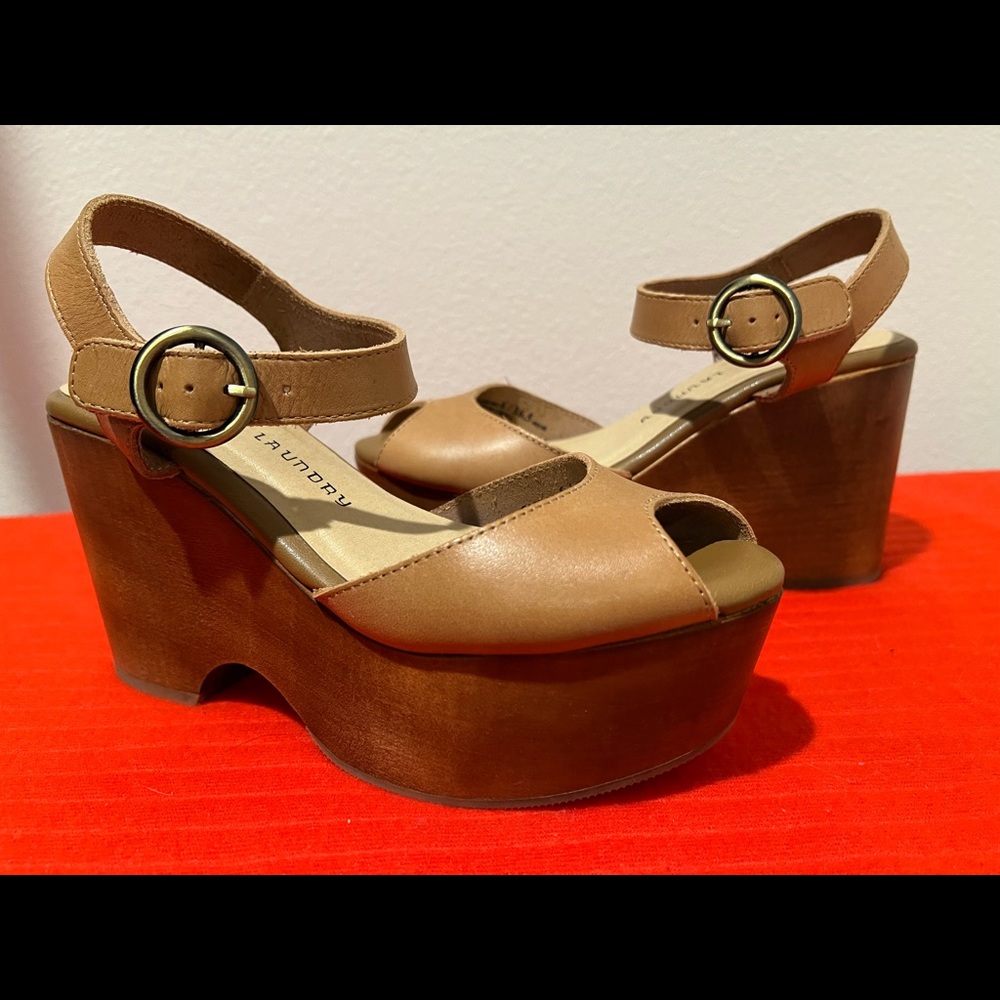 Barely used nude/tan leather, platform bottom